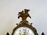 a clock that is sitting on top of a table