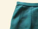 a close up of a pair of pants with buttons on them
