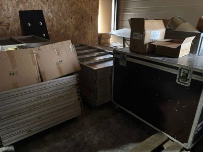 a room with a lot of boxes and boxes on the floor