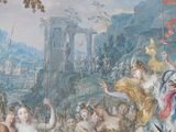 a painting on the wall of a room with a painting on the wall