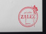 a picture of a red stamp on a white paper