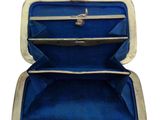 a blue case with a silver handle inside of it