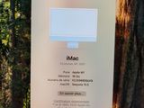 a sign on a tree with a picture of a computer on it