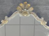 a mirror that is sitting on top of a tiled floor