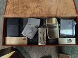 a box of lighters and lighters sitting on the floor