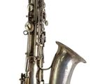 an image of a silver saxophone on a white background