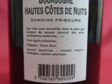 a bottle of wine on a table with a barcode on it