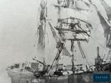a black and white photo of a boat in the water