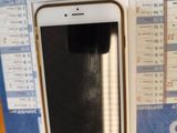 a cell phone that is in a box on a table
