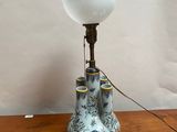 a lamp that is sitting on a wooden table