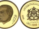 a close up of a coin with a picture of a man on it