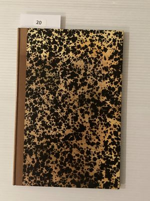 une image représentant un cahier à motif léopard noir et or, auquel est fixé un bloc-notes