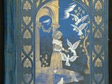 un vieux livre bleu avec l'image d'une femme entourée d'oiseaux