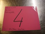 un post-it rose sur lequel est inscrit le chiffre 4