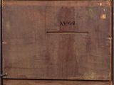 an old wooden box with a sign on it
