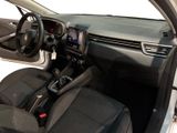 a picture of a car interior with a steering wheel and dashboard