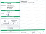a green and white id card with a picture of a person ' s identification