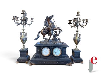 a statue of a man riding a horse on a clock