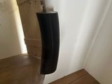 a black handle on a wooden table in a room