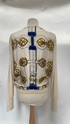 a close up of a mannequin wearing a jacket on a mannequin stand
