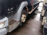 a truck that is parked on the side of the road