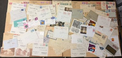 a suitcase full of letters and postcards sitting on a table