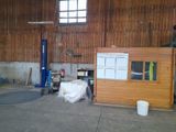 an image of a garage with a lot of wood