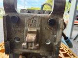 a close up of a metal device on a pallet
