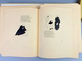 an open book with a picture of a man and a woman on it
