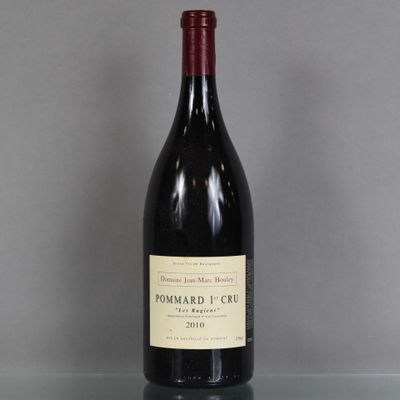a bottle of wine that is sitting on a table