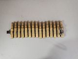 a close up of a bunch of brass pipes on a table