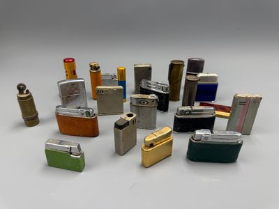 a lot of lighters that are sitting on a table