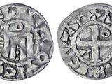 une pièce d'argent avec une croix au recto et une croix au verso