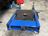 a close up of a blue trailer with a red box on it
