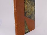 a book that is sitting on a white table