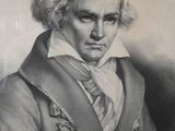an old picture of a man with curly hair wearing a coat