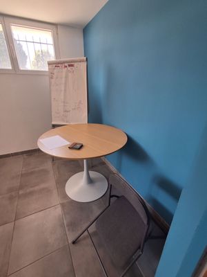 a small table in the corner of a room