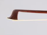 the bow of a violin is made of wood and has a curved handle