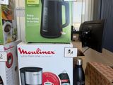 many boxes of coffee machines on the table