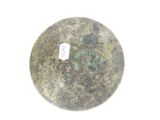 a picture of a stone bowl with a tag on it