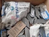 a cardboard box filled with lots of papers and tags