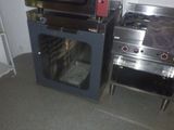 two ovens that are sitting next to each other in the kitchen