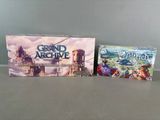 a couple of games sitting on top of a table next to each other