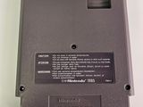 a close up of a video game on a white surface
