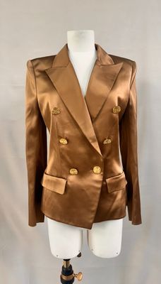 a brown blazer jacket on a mannequin mannequin mannequin mannequin mannequin mannequin mannequin mannequin mann