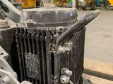 a machine that is sitting on a pallet in a warehouse