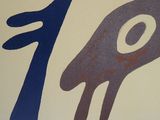 a picture of a sign with a hand and a bird on it