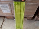 a bunch of green straws sitting in a package