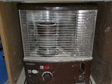 a toaster oven sitting inside of a cabinet in a room