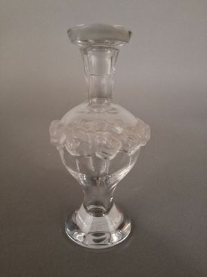 a glass vase that is sitting on a table